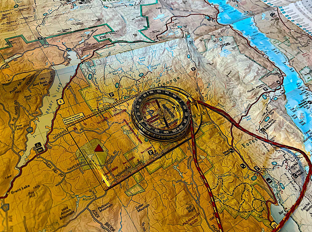 Compass on topographic map