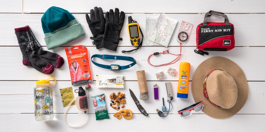 Essential hiking gear layout