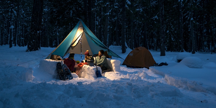 Winter camping in forest
